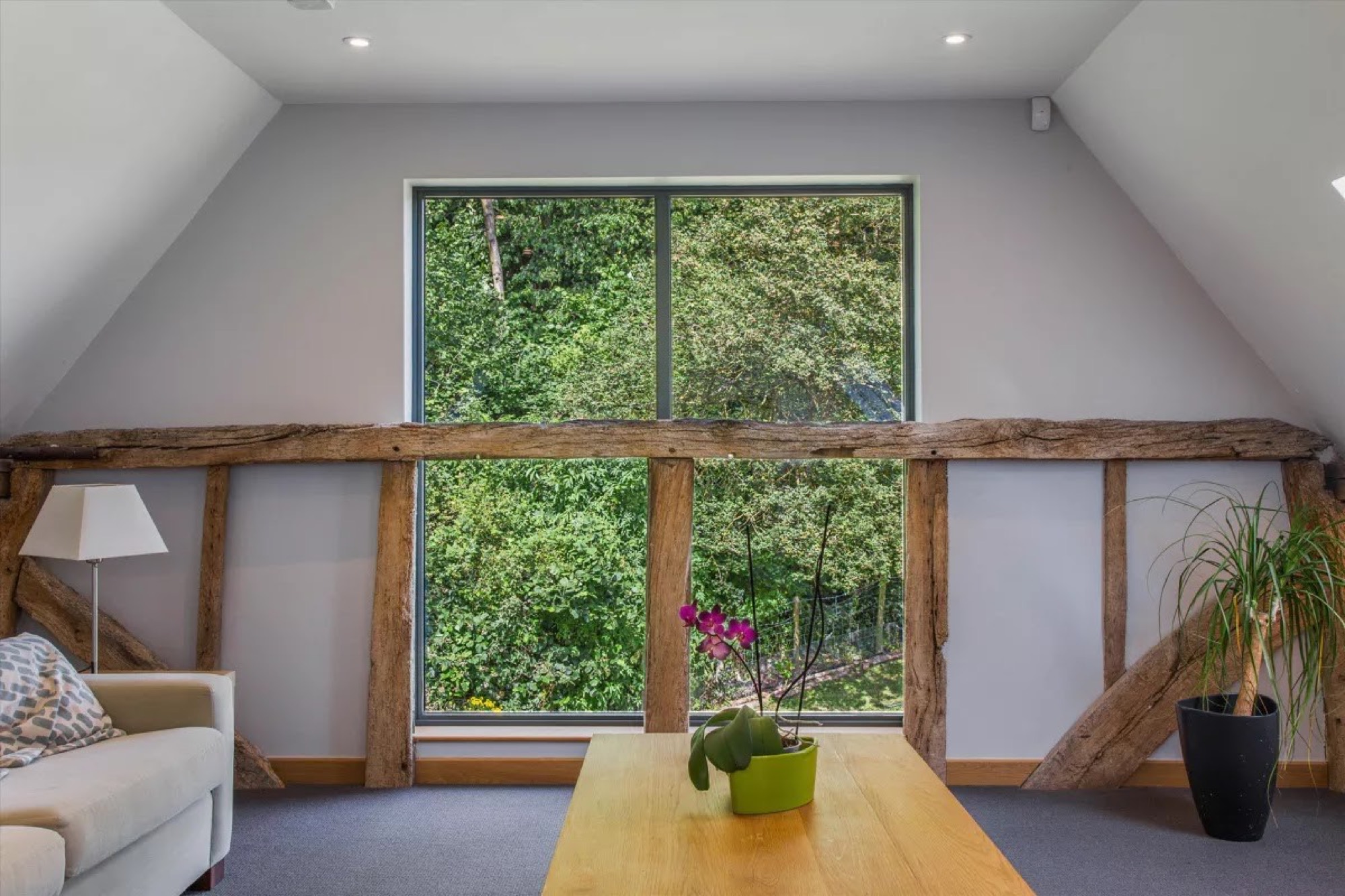 Exposed timber frame and window