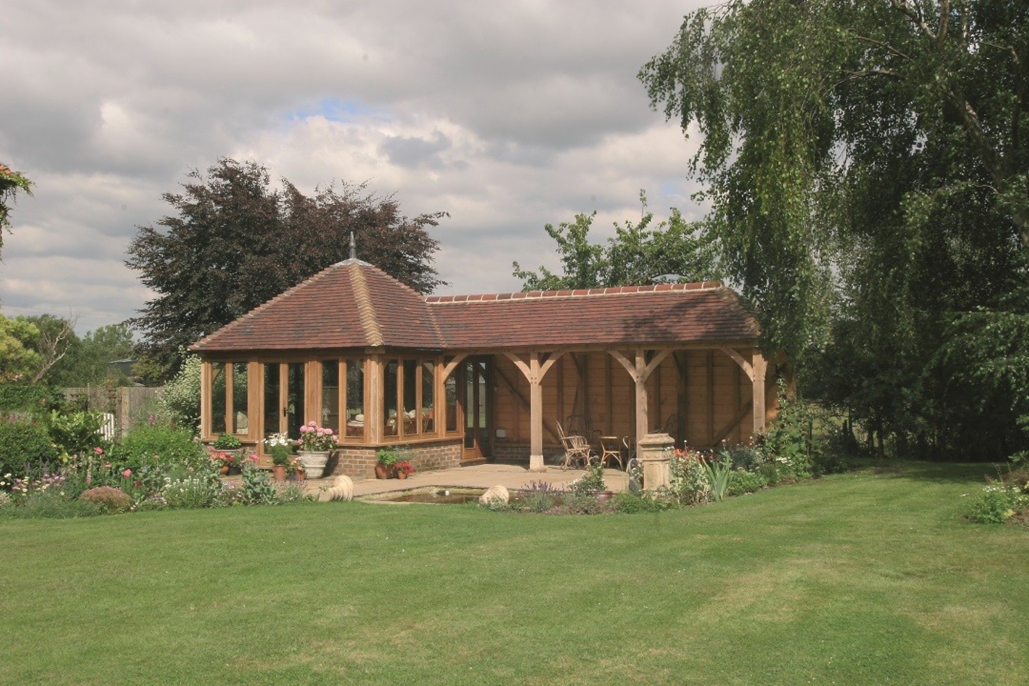 An oak-framed structure in a Kent garden