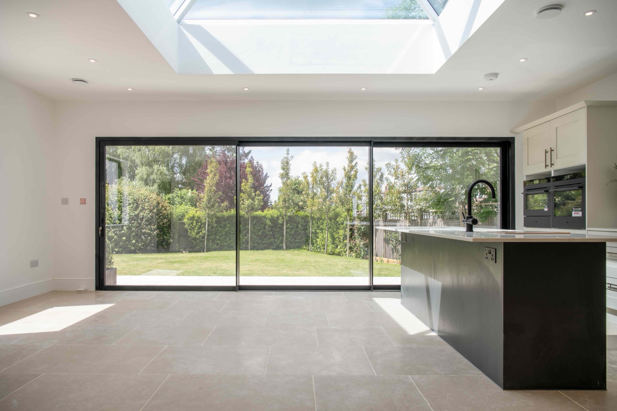 Kitchen and living space opening to the garden
